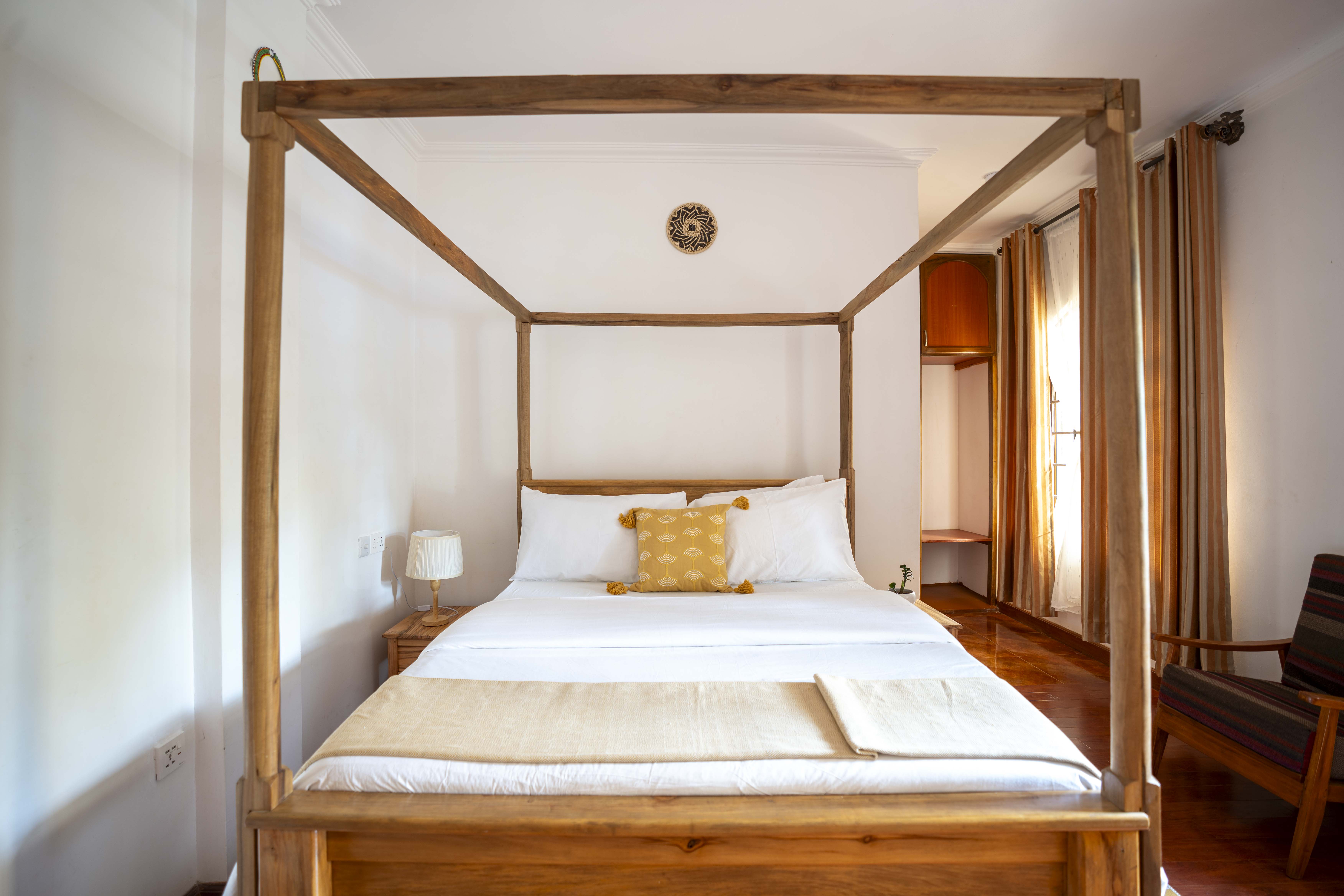 Beautifully arranged bed at Naibor Villa