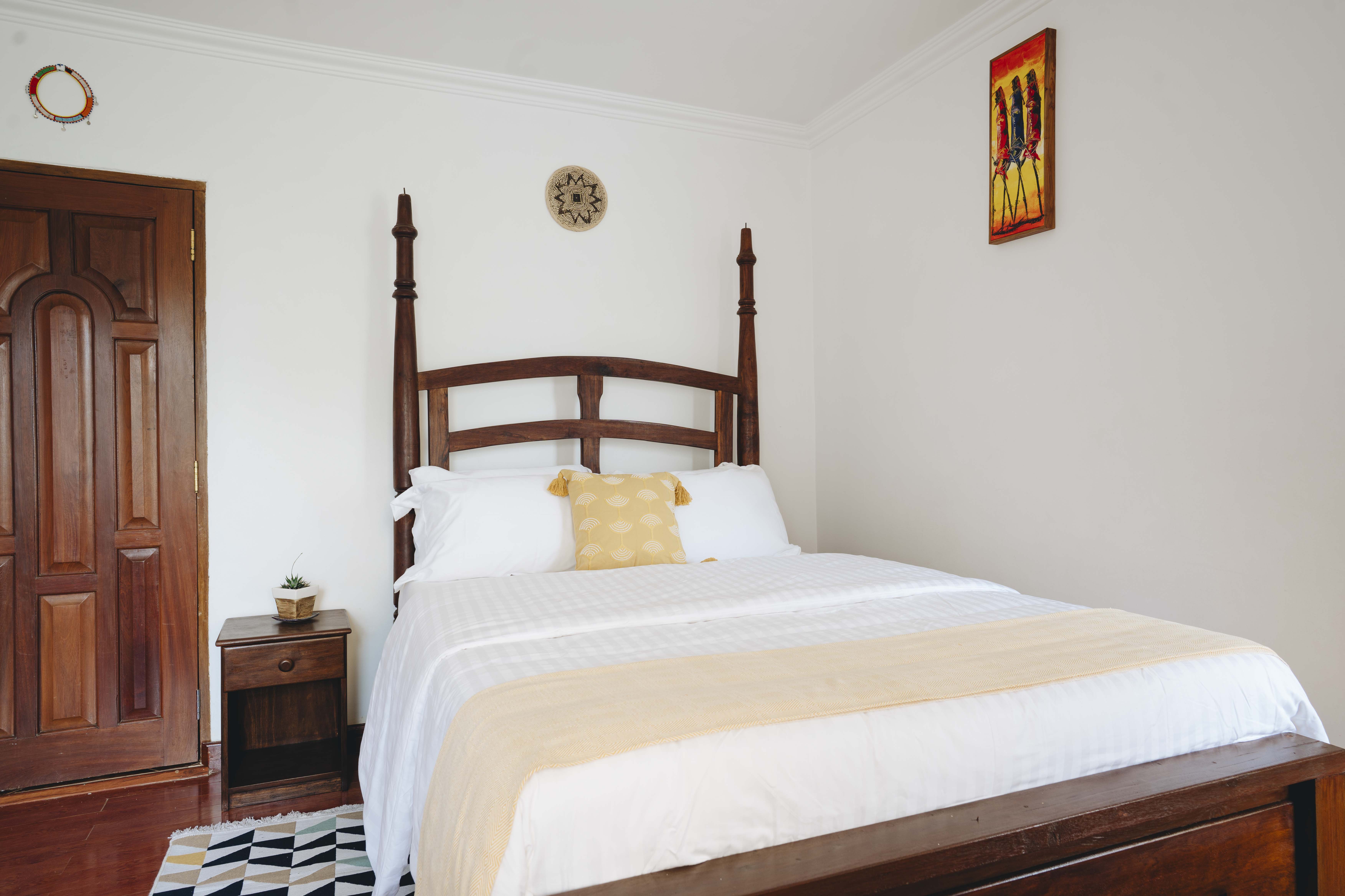 King bed setup in one of the villa rooms