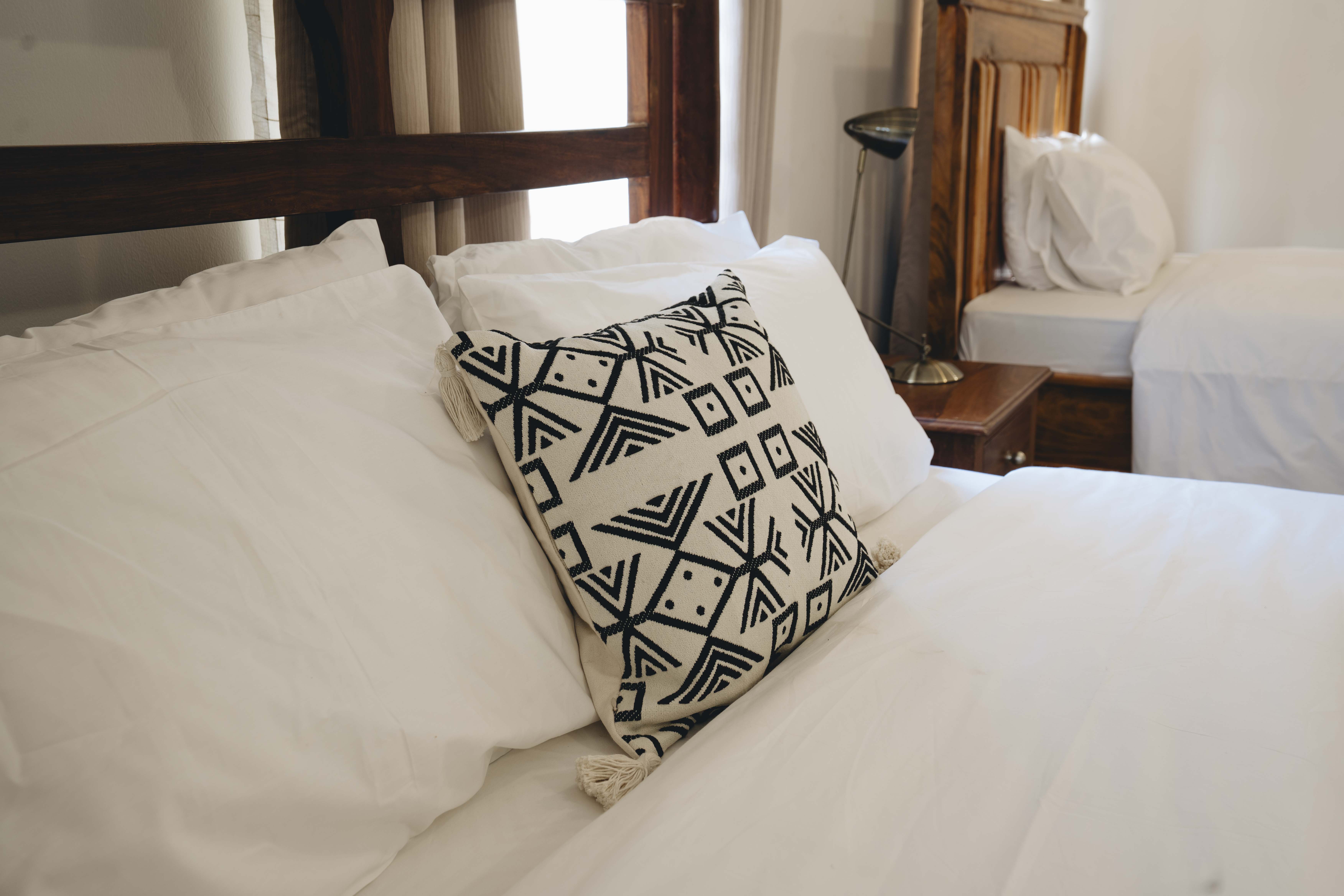 Comfortable bedding in a guest room