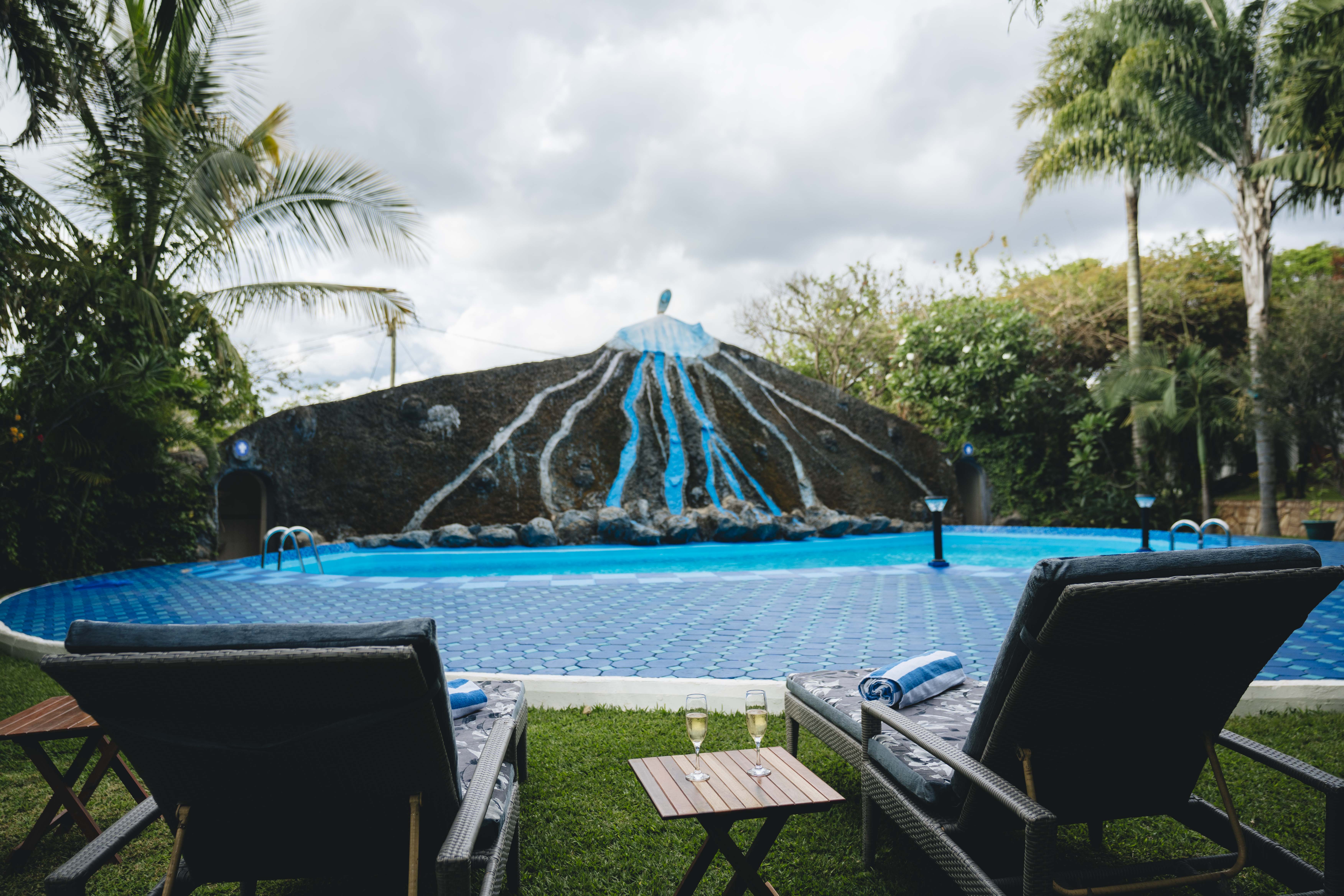 Pool area at Naibor Villa in daylight