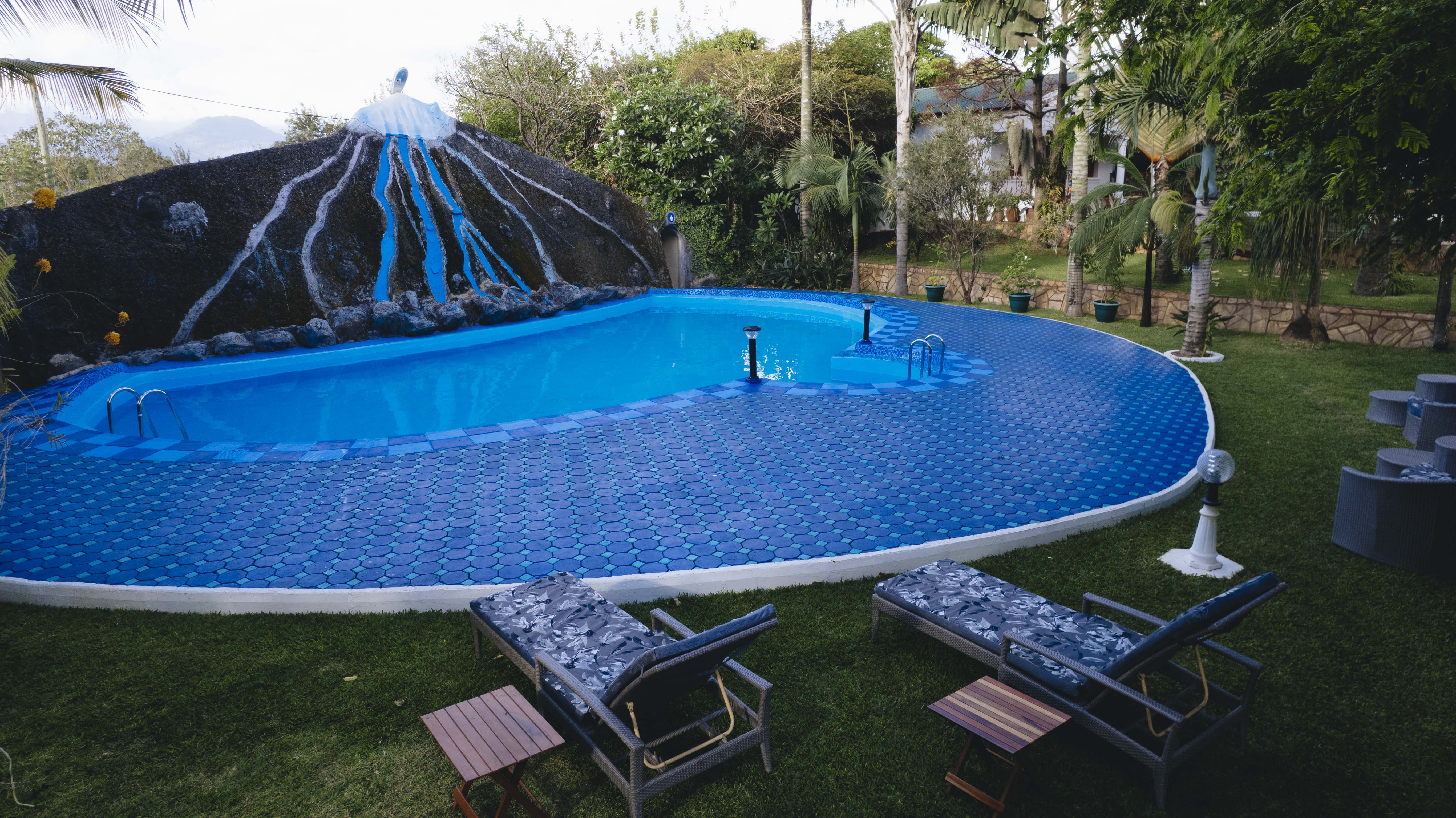 Scenic swimming pool view at Naibor Villa